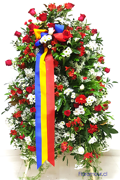 Lujosa composicin de pie apta para conmemoraciones o ceremoniales fnebre.
2 mts altura aprox. Colorido de la cinta y flores debe ser indicado por el cliente Tel 222341793 - Slo Santiago de Chile